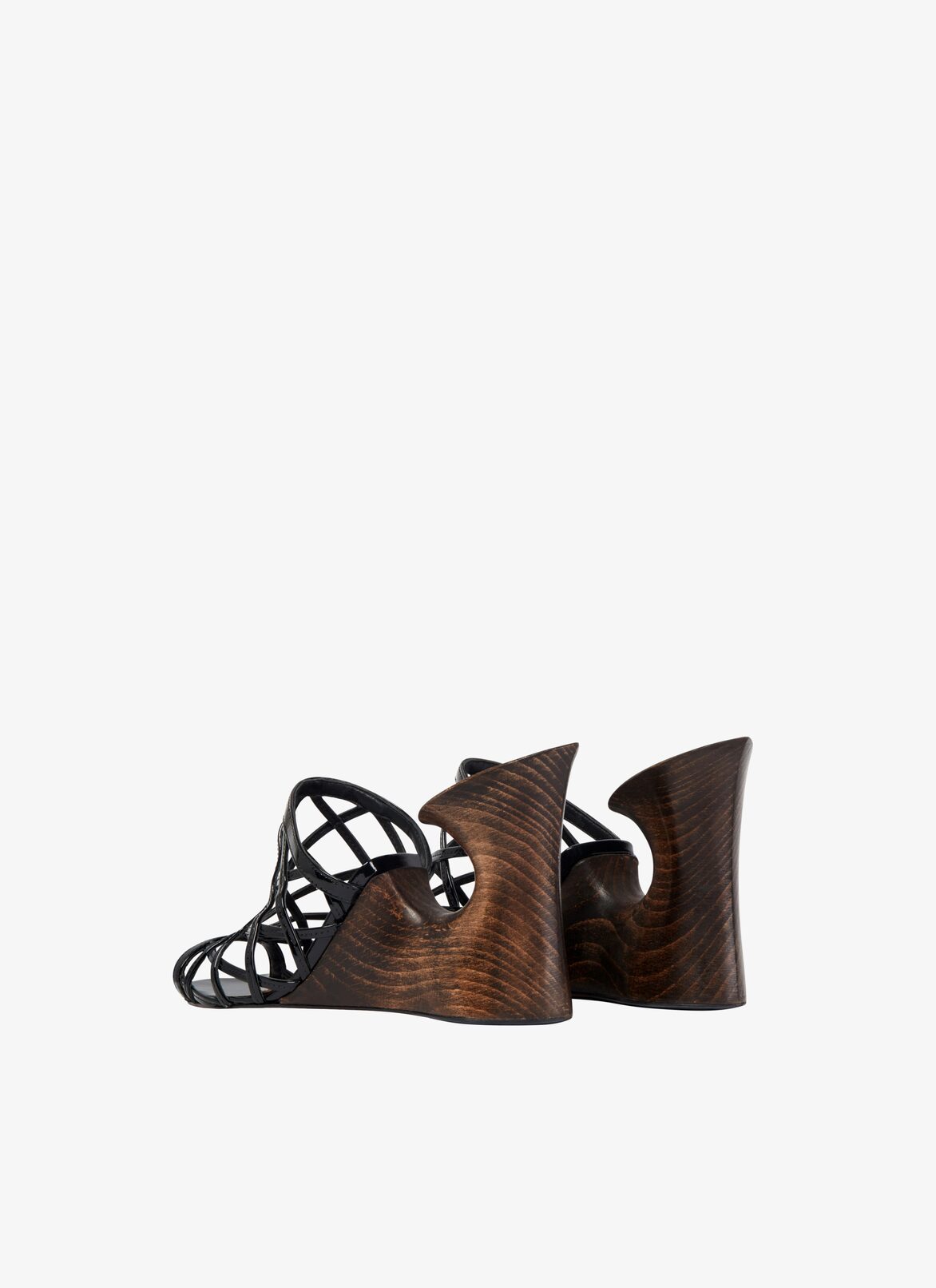 LA SCULPTURE MULES IN PATENT CALFSKIN & WOOD ALAÏA BLACK LA SCULPTURE MULES IN PATENT CALFSKIN & WOOD